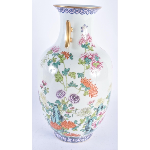 2093 - A LARGE CHINESE REPUBLICAN PERIOD TWIN HANDLED PORCELAIN VASE bearing Qianlong marks to base, painte... 