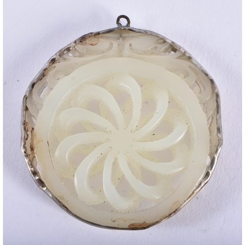 2174 - A 19TH CENTURY CHINESE CARVED SILVER MOUNTED JADE PLAQUE Late Qing. 24.2 grams. 5.5 cm wide.