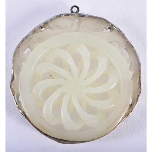 2174 - A 19TH CENTURY CHINESE CARVED SILVER MOUNTED JADE PLAQUE Late Qing. 24.2 grams. 5.5 cm wide.