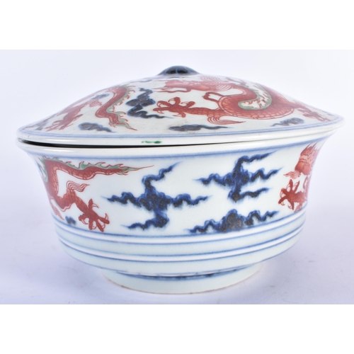 2196 - A CHINESE BLUE AND WHITE IRON RED PAINTED DRAGON BOWL AND COVER 20th Century, bearing Xuantong marks... 