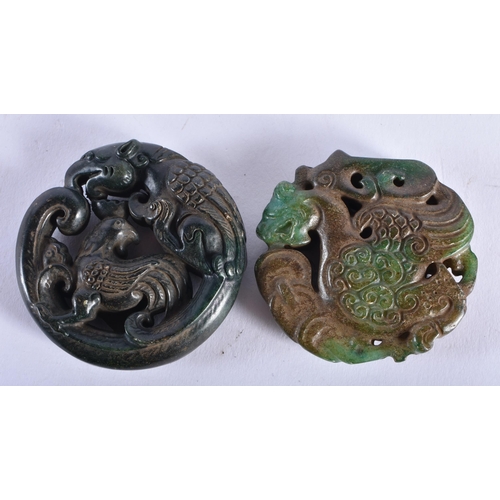 2215 - TWO CHINESE JADE ROUNDELS 20th Century. 100.5 grams. 5.25 cm wide. (2)