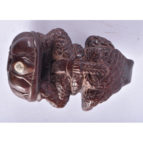 2220 - A JAPANESE CARVED WOOD FROG NETSUKE. 16.9 grams. 6 cm x 4 cm.