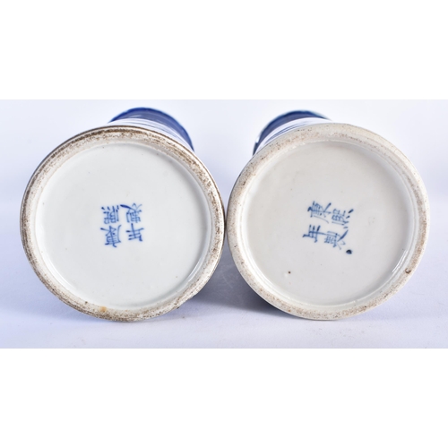 2223 - A PAIR OF 19TH CENTURY CHINESE BLUE AND WHITE PORCELAIN SLEEVE VASES bearing Kangxi marks to base. 3... 