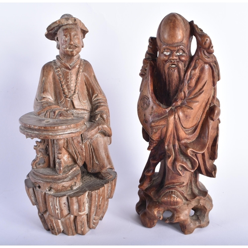 2225 - AN 18TH CENTURY CHINESE CARVED WOOD FIGURE OF A SCHOLAR Qing, together with another hardwood figure.... 