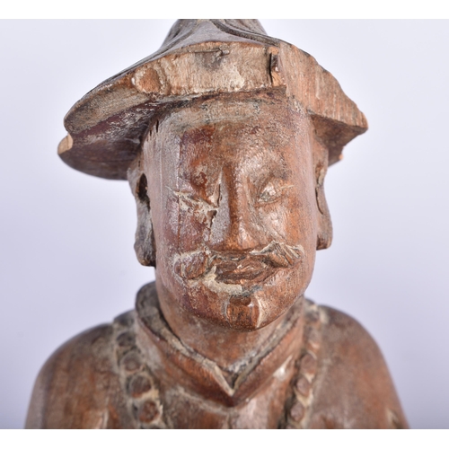 2225 - AN 18TH CENTURY CHINESE CARVED WOOD FIGURE OF A SCHOLAR Qing, together with another hardwood figure.... 