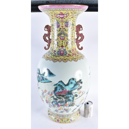 2240 - A VERY LARGE CHINESE FAMILLE ROSE TWIN HANDLED PORCELAIN VASE 20th Century. 77 cm high.