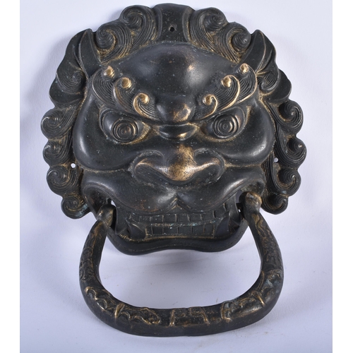 2334 - A PAIR OF CHINESE TIBETAN BRONZE MASK DOOR KNOCKERS 20th Century. 20 cm x 15 cm.