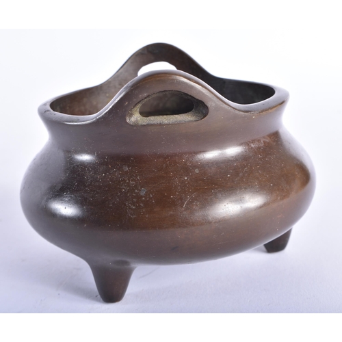 2440 - A CHINESE TWIN HANDLED BRONZE CENSER 20th Century. 10.5 cm wide, internal width 9 cm.