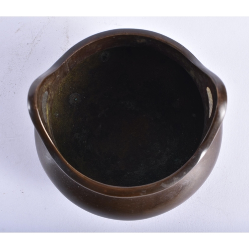 2440 - A CHINESE TWIN HANDLED BRONZE CENSER 20th Century. 10.5 cm wide, internal width 9 cm.