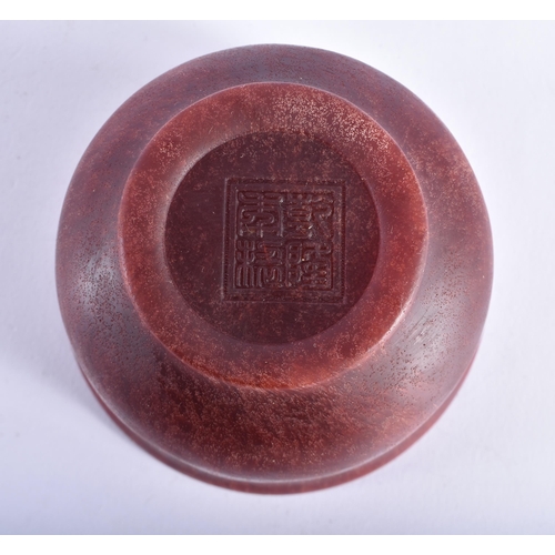 2441 - A CHINESE CARVED BUFFALO HORN TYPE BOWL 20th Century. 10 cm diameter.