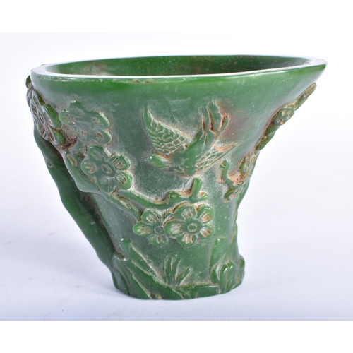 2442 - A CHINESE CARVED GREEN JADE TYPE LIBATION CUP 20th Century. 535 grams. 12 cm x 9 cm.