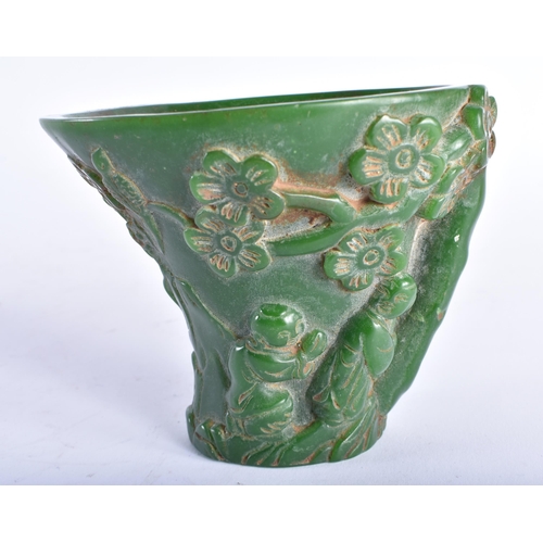 2442 - A CHINESE CARVED GREEN JADE TYPE LIBATION CUP 20th Century. 535 grams. 12 cm x 9 cm.