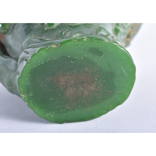 2442 - A CHINESE CARVED GREEN JADE TYPE LIBATION CUP 20th Century. 535 grams. 12 cm x 9 cm.