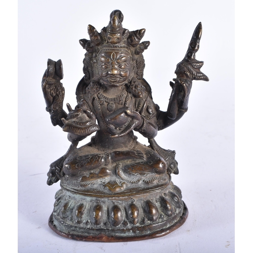 2456 - A 19TH CENTURY TIBETAN BRONZE FIGURE OF A BUDDHA modelled upon a lotus form base. 13 cm x 9 cm.