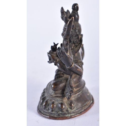 2456 - A 19TH CENTURY TIBETAN BRONZE FIGURE OF A BUDDHA modelled upon a lotus form base. 13 cm x 9 cm.