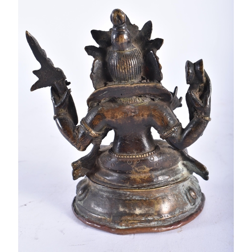 2456 - A 19TH CENTURY TIBETAN BRONZE FIGURE OF A BUDDHA modelled upon a lotus form base. 13 cm x 9 cm.