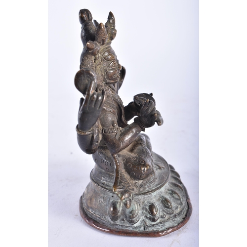 2456 - A 19TH CENTURY TIBETAN BRONZE FIGURE OF A BUDDHA modelled upon a lotus form base. 13 cm x 9 cm.