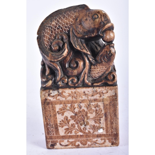 2458 - A CHINESE REPUBLICAN PERIOD FISH SEAL. 16 cm x 8 cm.