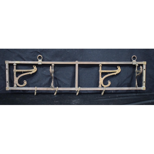 A 19th Century Mahogany shelf together with a metal coat rack, wooden