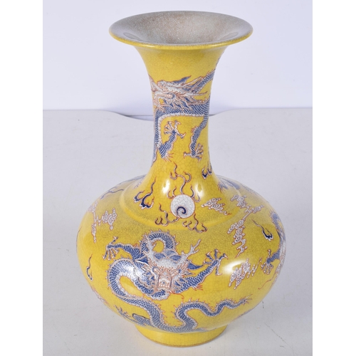 3037 - A Chinese porcelain crackle glazed Dragon vase 25cm.