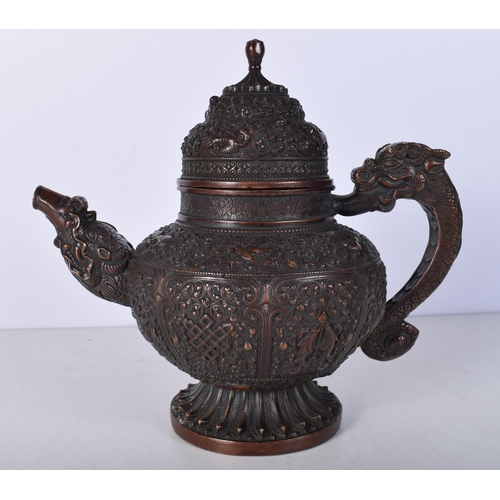 3040 - A Tibetan bronze Ewer 24cm