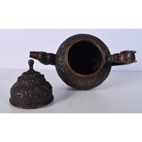 3040 - A Tibetan bronze Ewer 24cm