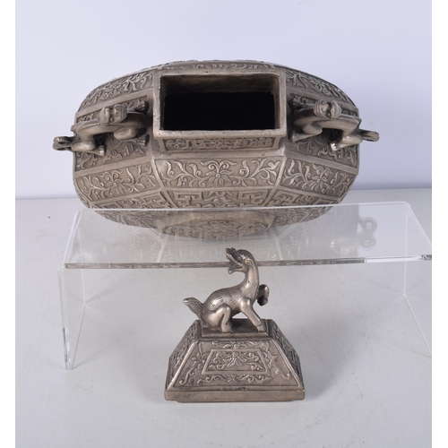 3041 - A Chinese white metal  embossed Moon Flask decorated with twin beast handles and a floral pattern 34... 