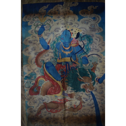 3051 - A Tibetan silk Tanka 111 x 80 cm.