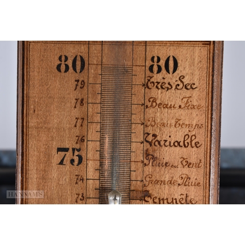 100 - AN ANTIQUE FRENCH CARVED WOOD BAROMETER. 100 cm high.