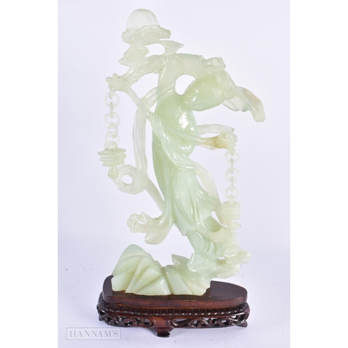 101 - TWO EARLY 20TH CENTURY CHINESE CARVED JADE FIGURES OF IMMORTALS Late Qing. Largest 30 cm high. (2)