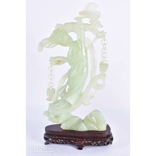 101 - TWO EARLY 20TH CENTURY CHINESE CARVED JADE FIGURES OF IMMORTALS Late Qing. Largest 30 cm high. (2)