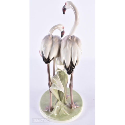 103 - AN ART DECO AUSTRIAN VIENNA KERAMOS CERAMIC FIGURE OF FLAMINGOS. 31 cm high.