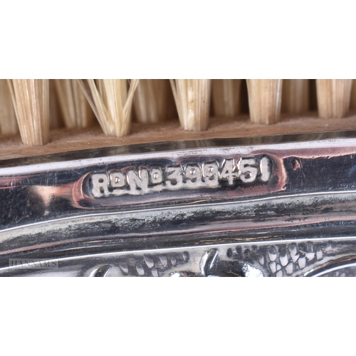 109 - A LOVELY ART NOUVEAU SILVER BACKED BRUSH decorated with a maiden. Birmingham 1927. 229 grams overall... 