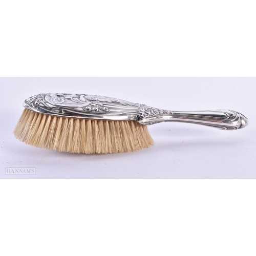 109 - A LOVELY ART NOUVEAU SILVER BACKED BRUSH decorated with a maiden. Birmingham 1927. 229 grams overall... 