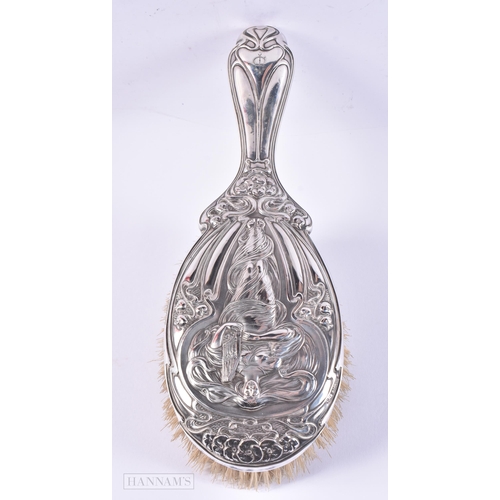 109 - A LOVELY ART NOUVEAU SILVER BACKED BRUSH decorated with a maiden. Birmingham 1927. 229 grams overall... 