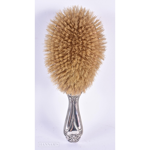 109 - A LOVELY ART NOUVEAU SILVER BACKED BRUSH decorated with a maiden. Birmingham 1927. 229 grams overall... 