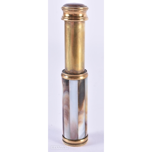 118 - AN ANTIQUE FRENCH MOTHER OF PEARL PUSH UP SCENT BOTTLE. 46.9 grams. 10 cm long extended.