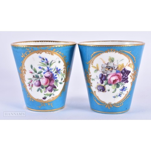 128 - A PAIR OF EARLY 19TH CENTURY CONTINENTAL SEVRES COALPORT PORCELAIN BEAKERS painted with flowers unde... 