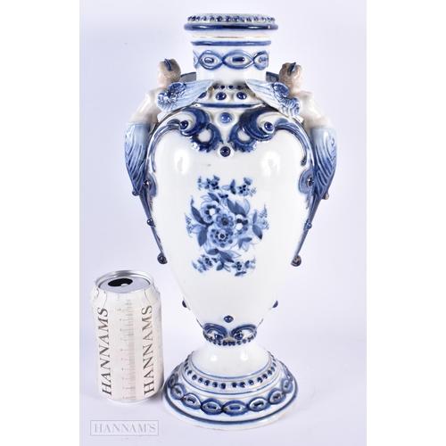 129 - A LARGE 19TH CENTURY GERMAN BLUE AND WHITE PORCELAIN VASE Attributed to Meissen. 36 cm x 16 cm.