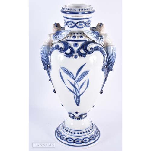 129 - A LARGE 19TH CENTURY GERMAN BLUE AND WHITE PORCELAIN VASE Attributed to Meissen. 36 cm x 16 cm.