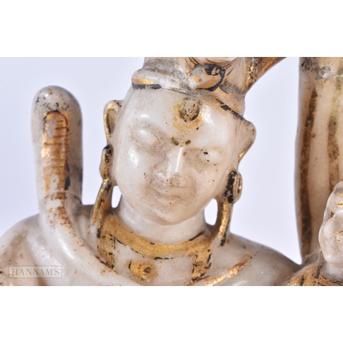 130 - AN 18TH/19TH CENTURY INDIAN RAJASTHAN LACQUERED MARBLE FIGURE OF A DEITY modelled with an attendant.... 