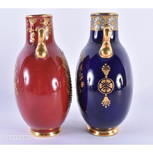 131 - A FINE PAIR OF COALPORT TWIN HANDLED PORCELAIN JEWELLED PILGRIM FLASKS both enamelled in relief with... 