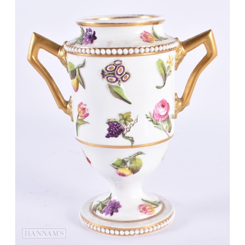 140 - AN EARLY 19TH CENTURY SPODE TWIN HANDLED PORCELAIN VASE decorated in relief with studies of flowers.... 