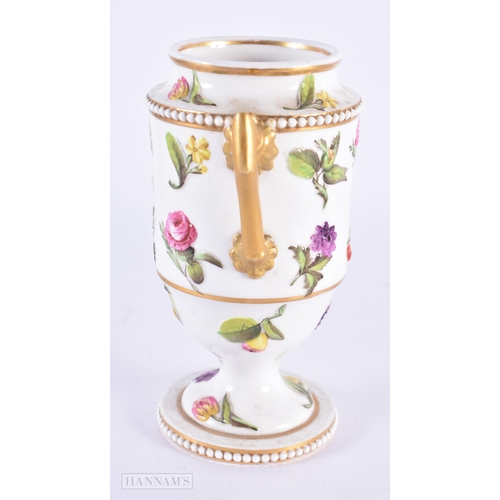 140 - AN EARLY 19TH CENTURY SPODE TWIN HANDLED PORCELAIN VASE decorated in relief with studies of flowers.... 