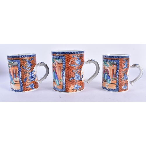 145 - A RARE SET OF THREE 18TH CENTURY CHINESE EXPORT FAMILLE ROSE MANDARIN MUGS Qianlong, of graduated fo... 