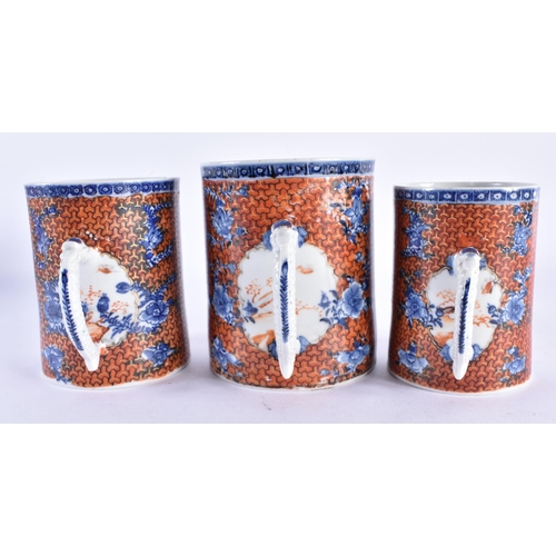 145 - A RARE SET OF THREE 18TH CENTURY CHINESE EXPORT FAMILLE ROSE MANDARIN MUGS Qianlong, of graduated fo... 