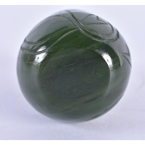 149 - A LATE 19TH CENTURY CHINESE CARVED SPINACH JADE SNUFF BOTTLE AND STOPPER Late Qing. 7.25 cm high.