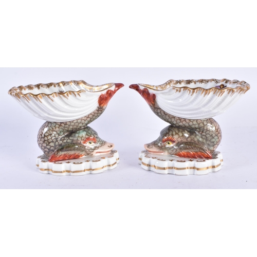 157 - AN UNUSUAL PAIR OF 19TH CENTURY GERMAN KPM BERLIN PORCELAIN SALTS painted with exotic birds. 7 cm x ... 