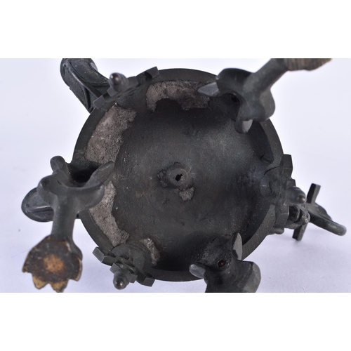 160 - A RARE 19TH CENTURY EUROPEAN GRAND TOUR BRONZE OIL LAMP formed as a seated scribe with double spouts... 