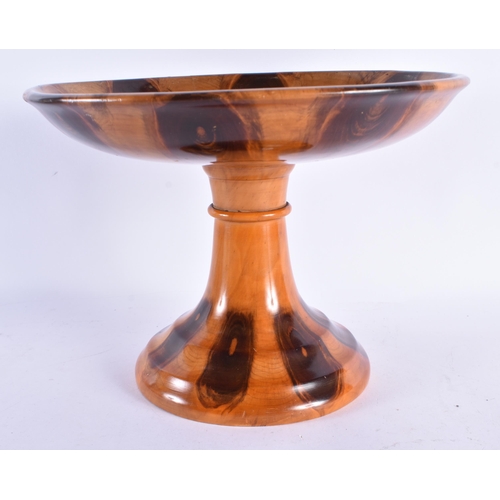 171 - AN ANTIQUE TREEN CARVED WOOD PEDESTAL DISH possibly Monkey Puzzle wood. 27 cm x 20 cm.